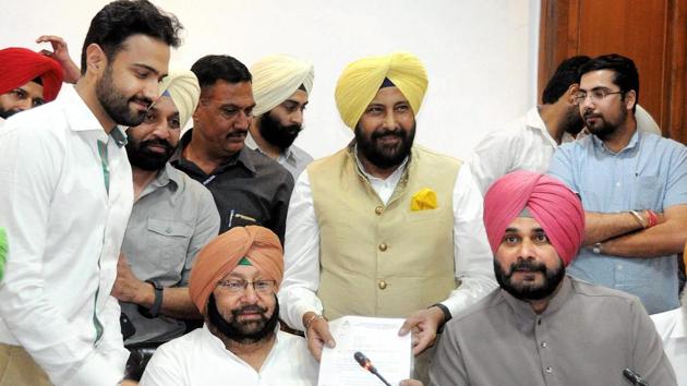 Navjot Sidhu loses key portfolio in tussle with Punjab CM, gets a face ...