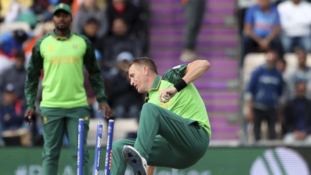 South Africa's Chris Morris falls on the stumps after taking the catch to dismiss India's MS Dhoni during the Cricket World Cup match between South Africa and India at the Hampshire Bowl in Southampton, England, Wednesday, June 5, 2019. (AP Photo/Aijaz Rahi)(AP)