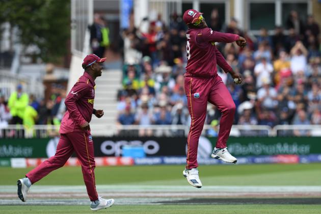 West Indies' Sheldon Cottrell celebrates making the catch to dismiss Australia's Steve Smith for 73 during the 2019 Cricket World Cup group stage match between Australia and West Indies at Trent Bridge in Nottingham. (AFP)