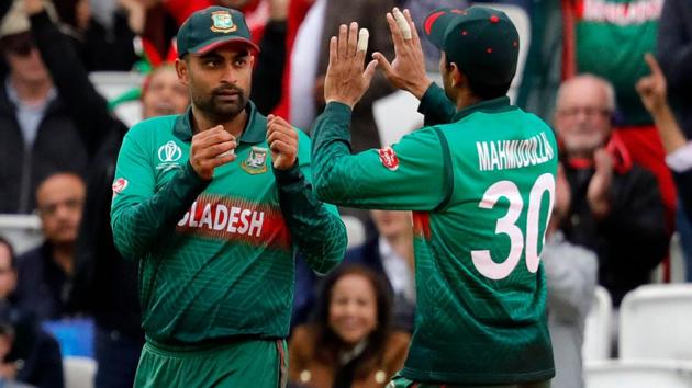 Bangladesh's Tamim Iqbal (L) is congratulated by Bangladesh's Mahmudullah (R). (AFP) Bangladesh's Tamim Iqbal (L) is congratulated by Bangladesh's Mahmudullah (R). (AFP)