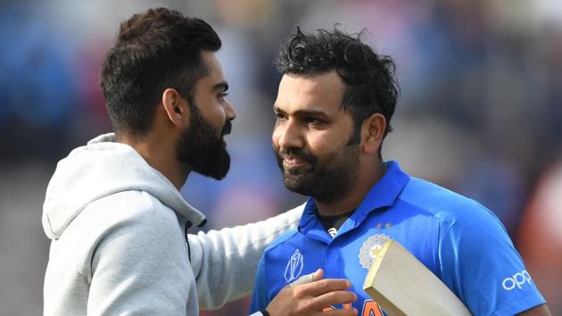 India captain Virat Kohli greets Rohit Sharma after his match-winning innings against South Africa. (AFP) India captain Virat Kohli greets Rohit Sharma after his match-winning innings against South Africa. (AFP)