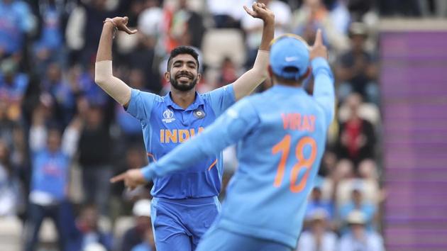 India's Jasprit Bumrah, left, celebrates with captain Virat Kohli, right, the dismissal of South Africa's Hashim Amla.(AP)