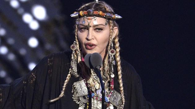 FILE - In this Aug. 20, 2018 file photo, Madonna presents a tribute to Aretha Franklin at the MTV Video Music Awards at Radio City Music Hall in New York. (Chris Pizzello/Invision/AP) FILE - In this Aug. 20, 2018 file photo, Madonna presents a tribute to Aretha Franklin at the MTV Video Music Awards at Radio City Music Hall in New York. (Chris Pizzello/Invision/AP)