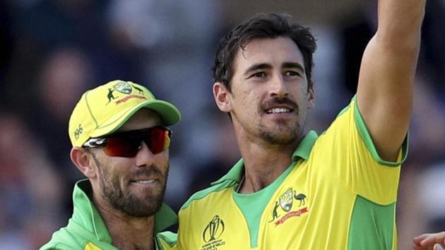 Nottingham: Australia's Mitchell Starc, center, holds up the ball to celebrate the dismissal of West Indies' Sheldon Cottrell. (AP)