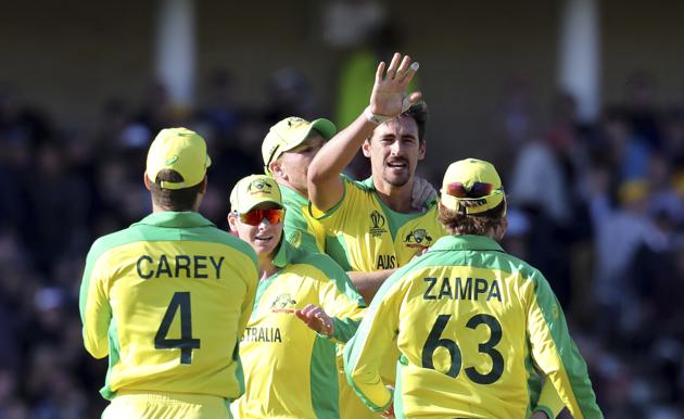Australia's Mitchell Starc, second right, celebrates with teammates the dismissal of a West Indies batsman during the Cricket World Cup match between Australia and West Indies at Trent Bridge in Nottingham. (AP)