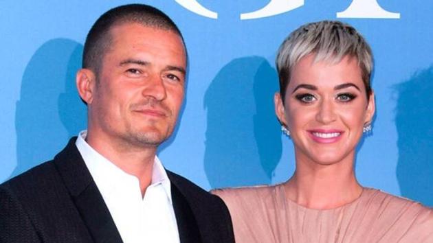 Four months into their engagement, Orlando Bloom and Katy Perry are in no rush to tie the knot.