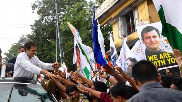 The Congress chief was seen making his way through the roads of Wayanad in an open truck and reaching his hand out to greet supporters. (RG Wayanad office/Twitter) The Congress chief was seen making his way through the roads of Wayanad in an open truck and reaching his hand out to greet supporters. (RG Wayanad office/Twitter)