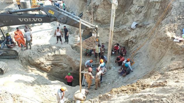Massive rescue operation was underway Friday to safely pull out a two-year-old boy who fell into an over 150-foot-deep borewell in a field near his house in Punjab’s Sangrur district, officials said. Fatehvir Singh fell into the unused borewell while he was playing near his house at around 4 pm Thursday, district administration officials said earlier. (Avtar Singh / HT Photo)