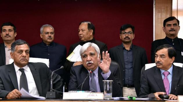 Chief Election Commissioner (C) Sunil Arora with Election Commissioner Ashok Lavasa (L) and CBDT Chairman Sushil Chandra (R) addressing a press conference in Lucknow.(ANI/ File photo)