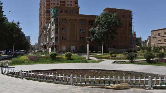 A garden where the Gujan Derwaza mosque once stood in Hotan. In recent years, Chinese authorities have ramped up controls on public displays of religion and Islamic traditions in Xinjiang. “The situation here is very strict, it takes a toll on my heart,” said one Uighur. “I don’t go any more,” he added, referring to mosques. “I’m scared.” (Greg Baker / AFP) A garden where the Gujan Derwaza mosque once stood in Hotan. In recent years, Chinese authorities have ramped up controls on public displays of religion and Islamic traditions in Xinjiang. “The situation here is very strict, it takes a toll on my heart,” said one Uighur. “I don’t go any more,” he added, referring to mosques. “I’m scared.” (Greg Baker / AFP)