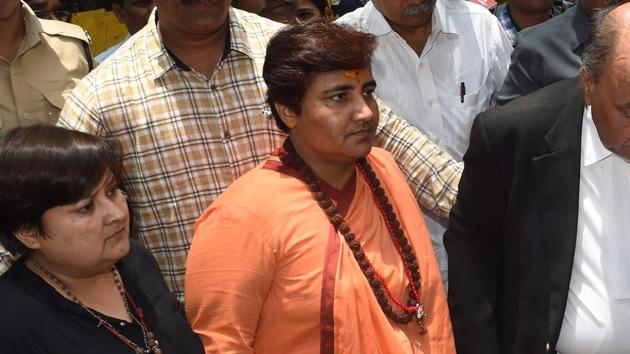 Sadhvi Pragya Thakur (C) arrives to appear in the special court in Mumbai on June 7, 2019.(AFP) Sadhvi Pragya Thakur (C) arrives to appear in the special court in Mumbai on June 7, 2019.(AFP)