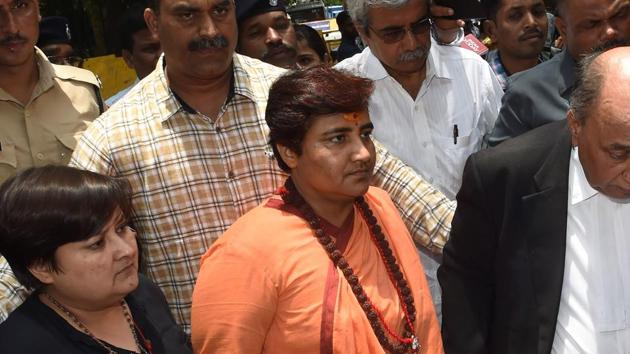 BJP MP Pragya Singh Thakur, who had skipped proceedings on Thursday on grounds of ill health, appeared before a special NIA court along with two other accused in connection with the 2008 Malegaon blast case. (AFP)