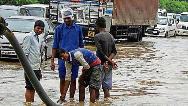 The agency will have to ensure ready availability of at least 30 workers, four tractors fitted with sewer suction machines, tankers, four trolleys fitted with high-power diesel pump sets, one JCB machine and 500 gunny bags filled with sand. (Yogendra Kumar/HT Archive) The agency will have to ensure ready availability of at least 30 workers, four tractors fitted with sewer suction machines, tankers, four trolleys fitted with high-power diesel pump sets, one JCB machine and 500 gunny bags filled with sand. (Yogendra Kumar/HT Archive)