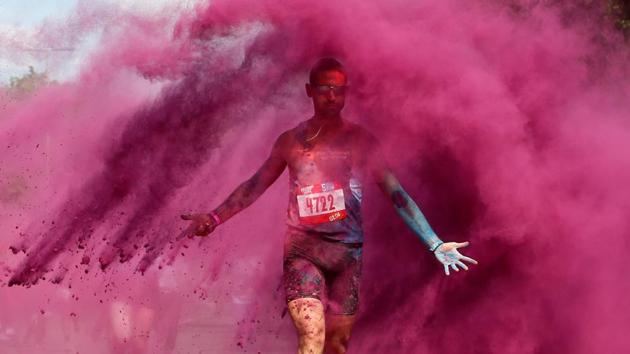 A participant runs through coloured powder during the Colour Run race in Moscow, Russia. (Evgenia Novozhenina / REUTERS) A participant runs through coloured powder during the Colour Run race in Moscow, Russia. (Evgenia Novozhenina / REUTERS)