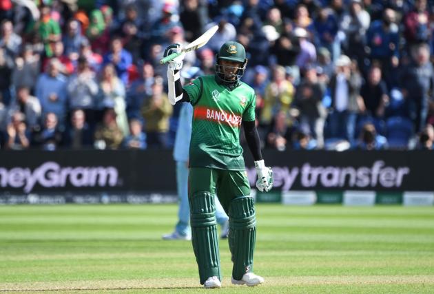Bangladesh's Shakib Al Hasan celebrates after scoring a century (100 runs) during the 2019 Cricket World Cup group stage match between England and Bangladesh at Sophia Gardens stadium in Cardiff. (AFP)