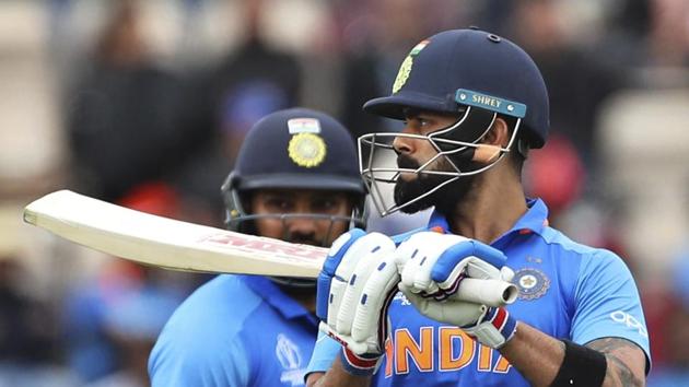 India's Rohit Sharma, left, watches captain Virat Kohli react after being dismissed during the Cricket World Cup match between South Africa and India at the Hampshire Bowl in Southampton, England, Wednesday, June 5, 2019. (AP Photo/Aijaz Rahi)(AP)