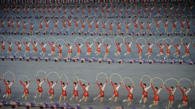 Performers during a 'Grand Mass Gymnastics and Artistic Performance', or mass games, at the May Day stadium in Pyongyang, North Korea. (Kim Won Jin / AFP) Performers during a 'Grand Mass Gymnastics and Artistic Performance', or mass games, at the May Day stadium in Pyongyang, North Korea. (Kim Won Jin / AFP)