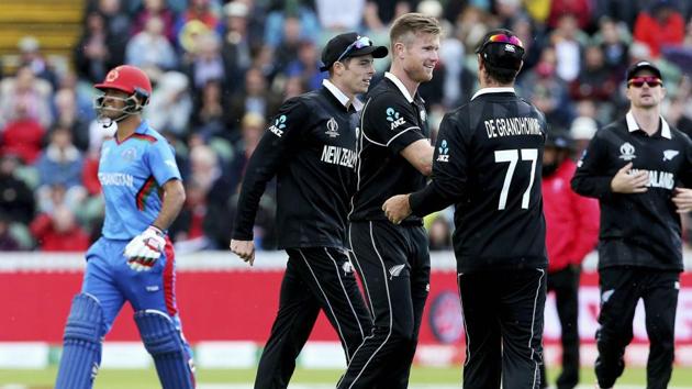 NZ’s James Neesham celebrates taking the wicket of Afghanistan's Najibullah Zadran. (AP)