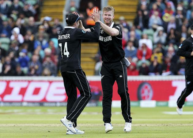 Taunton: New Zealand's James Neesham, right, celebrates with Mitchell Santner taking the wicket of Afghanistan's Najibullah Zadran, during the ICC Cricket World Cup group stage match between Afghanistan and New Zeland. (AP)