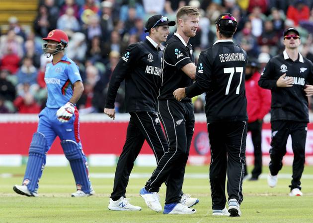 Taunton: New Zealand's James Neesham celebrates taking the wicket of Afghanistan's Najibullah Zadran with Colin de Grandhomme during the ICC Cricket World Cup group stage match between Afghanistan and New Zeland. (AP)