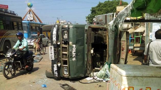 West Bengal, June 08 (ANI): A police bus is seen lying sideways after a clash between BJP workers and police in South Dinajpur on Saturday.(ANI file photo)