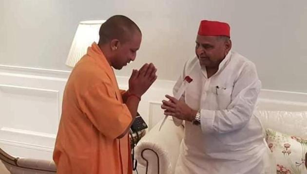 Uttar Pradesh chief minister Yogi Adityanath called on Samajwadi Party patriarch Mulayam Singh Yadav on Monday to inquire after his health.(HT Photo)