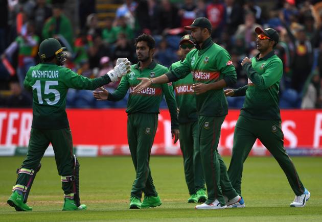 Bangladesh's captain Mashrafe Mortaza (C) celebrates with teammates. (AFP) Bangladesh's captain Mashrafe Mortaza (C) celebrates with teammates. (AFP)