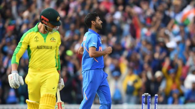 Bhuvneshwar Kumar celebrates after the dismissal of Australia's Marcus Stoinis (L). (AFP) Bhuvneshwar Kumar celebrates after the dismissal of Australia's Marcus Stoinis (L). (AFP)