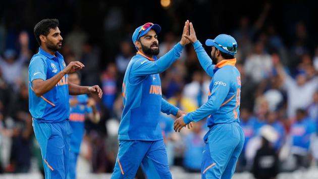 India's captain Virat Kohli (C) celebrates with his players after victory. (AFP) India's captain Virat Kohli (C) celebrates with his players after victory. (AFP)