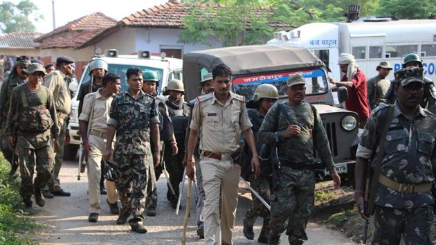 Additional police force rushed to Purihasa village after locals refused to release the woman they accused of being a witch. (Manoj Kumar / HT Photo) Additional police force rushed to Purihasa village after locals refused to release the woman they accused of being a witch. (Manoj Kumar / HT Photo)
