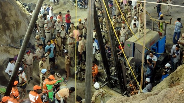 A two-year-old child, who had fallen into a 150-foot-deep unused borewell while playing, was pulled out of it this morning in a frantic rescue operation after almost 110 hours.(Bharat Bhushan / Hindustan Times) A two-year-old child, who had fallen into a 150-foot-deep unused borewell while playing, was pulled out of it this morning in a frantic rescue operation after almost 110 hours.(Bharat Bhushan / Hindustan Times)