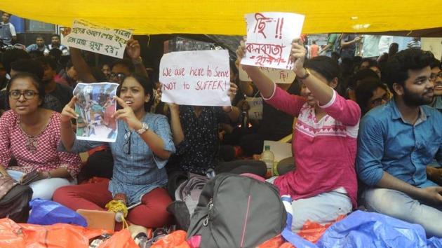 Junior doctors at NRS Medical College and Hospital went on strike here on Tuesday after one of their colleagues was allegedly attacked by the family of a patient who died on Monday.(Samir Jana/HT Photo)