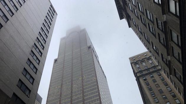 Mist and smoke cover the top of a building near 51st Street and 7th Avenue Monday, June 10, 2019, in New York, where a helicopter was reported to have crash landed on top of the roof of a building in midtown Manhattan. (AP photo) Mist and smoke cover the top of a building near 51st Street and 7th Avenue Monday, June 10, 2019, in New York, where a helicopter was reported to have crash landed on top of the roof of a building in midtown Manhattan. (AP photo)