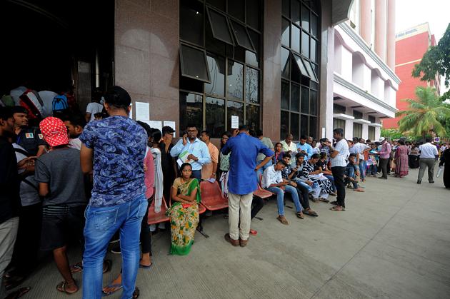 Students wait to apply for re-evaluation in Vashi.(HT Photo)