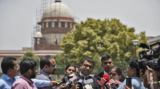 Lawyers along with Jagisha Arora, wife of journalist Prashant Kanojia, speak to journalists after the Supreme Court ordered immediate release of journalist Kanojia who was arrested for sharing a post against Uttar Pradesh chief minister Yogi Adityanath. (Burhaan Kinu / HT Photo)