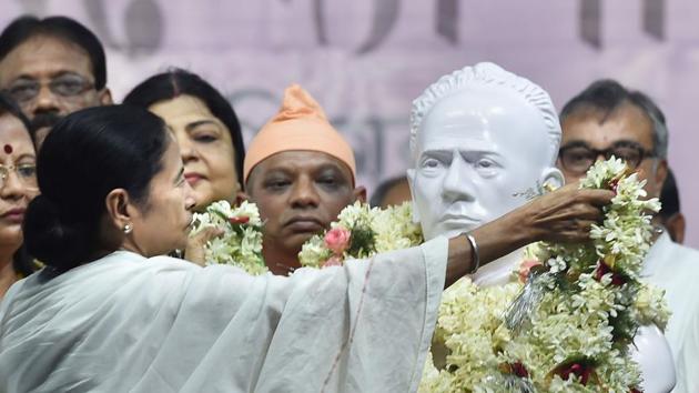 West Bengal Chief Minister Mamata Banerjee unveiled a bust of Ishwar Chandra Vidyasagar at the Hare School ground. The bust of Vidyasagar, a 19th-century social reformer, was vandalised in clashes between BJP and TMC workers at Vidyasagar College during BJP president Amit Shah’s roadshow on May 14. The unveiled bust will now be taken from here to Vidyasagar college where it will be re-installed at the same place where a similar statue was broken (Ashok Bhaumik / PTI)
