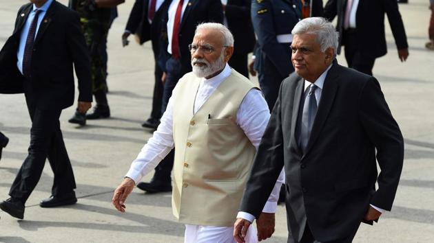 Sri Lankan Prime Minister Ranil Wickremesinghe walks with Prime Minister Narendra Modi, Bandaranaike International Airport, Colombo, June 9, 2019(AFP) Sri Lankan Prime Minister Ranil Wickremesinghe walks with Prime Minister Narendra Modi, Bandaranaike International Airport, Colombo, June 9, 2019(AFP)