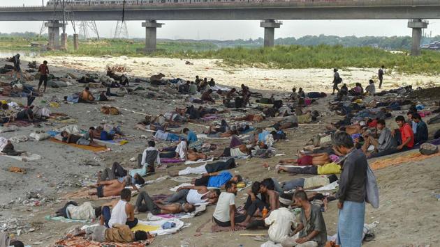 Homeless people sleep under a flyover on a hot day, in New Delhi. As several hospitals in Delhi witness a surge of patients with heat-related ailments amid a scorching summer, doctors Monday said the situation so far is “not alarming” and adequate arrangements are in place. (PTI) Homeless people sleep under a flyover on a hot day, in New Delhi. As several hospitals in Delhi witness a surge of patients with heat-related ailments amid a scorching summer, doctors Monday said the situation so far is “not alarming” and adequate arrangements are in place. (PTI)