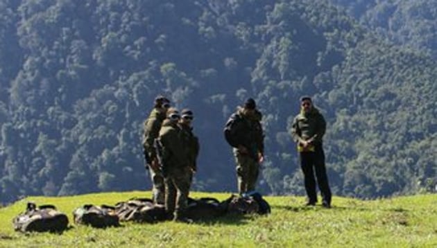 Members of the search team looking for survivors of teh AN-32 aircraft which crashed in Arunachal Pradesh on June 3. (ANI) Members of the search team looking for survivors of teh AN-32 aircraft which crashed in Arunachal Pradesh on June 3. (ANI)
