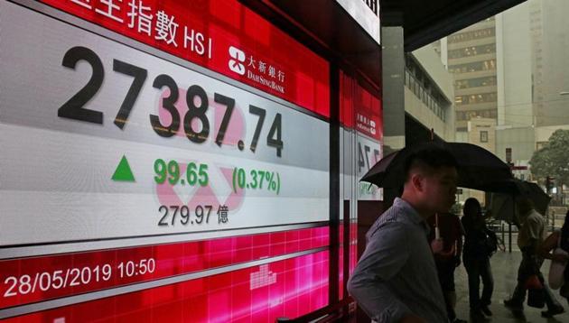 Hong Kong stocks tumbled and the currency soared as interbank interest rates jumped amid protests that closed roads in the city’s financial district.(AP File Photo) Hong Kong stocks tumbled and the currency soared as interbank interest rates jumped amid protests that closed roads in the city’s financial district.(AP File Photo)