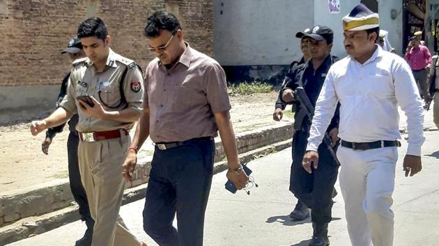 Administration officials visit the Tappal area in the aftermath of the murder of a two-and-a-half-year-old girl, in Aligarh, Sunday, June 9, 2019. (PTI) Administration officials visit the Tappal area in the aftermath of the murder of a two-and-a-half-year-old girl, in Aligarh, Sunday, June 9, 2019. (PTI)