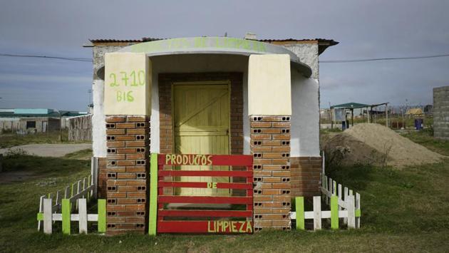 A closed store that used to sell cleaning products is seen inside the prison. Ten percent of the profits goes to the fund for entrepreneurs, another 10% goes to the government for use of the facilities and 10% goes to an association of victims of crime. The rest goes into accounts for the inmates, though they can’t fully access it until they are released. (Matilde Campodonico / AP)