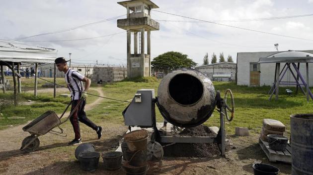 Juan Miguel Petit, who oversees prison affairs for Uruguay’s congress, said he knows dozens of prisons in the America and Europe and has never seen anything like Punta de Rieles. “The more we can manage to reproduce the life of a neighbourhood, the more we can foresee that the people who leave are going to behave in harmony with others.” (Matilde Campodonico / AP)