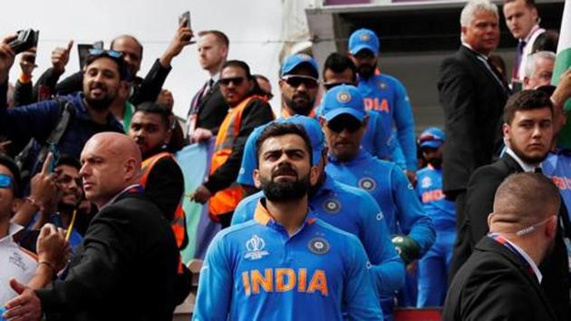 Virat Kohli leads his team out on the ground. (AFP Image) Virat Kohli leads his team out on the ground. (AFP Image)