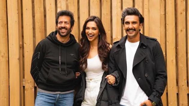 Deepika Padukone and Ranveer Singh pose with their director Kabir Khan as they gear up for 83.(Instagram)