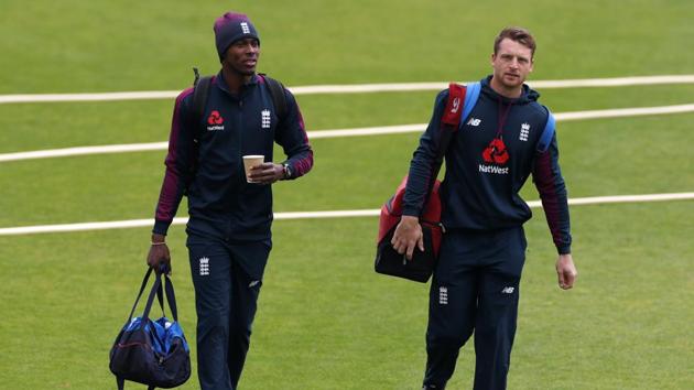 England's Jofra Archer and Jos Buttler arrive for nets.(Reuters)