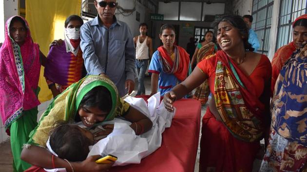 “Two more children died today due to Acute Encephalitis Syndrome (AES) at the Sri Krishna Medical College Hospital (SKMCH), Muzaffarpur, taking the death toll up to 37,” Bihar’s principal secretary, health, Sanjay Kumar has said. Till Monday, 28 children had died of AES at the SKMCH and seven at the Kejriwal Maternity Clinic. So far 143 cases have been reported from 11 districts in the state. (AFP) 