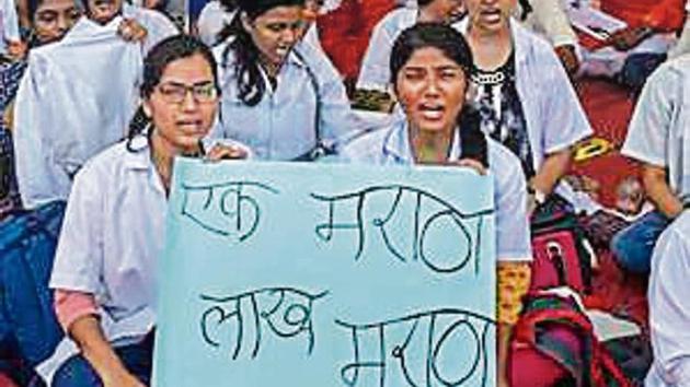 Medical students from Maratha community stage a protest at Azad Maidan, demanding implementation of the 16% quota under the SEBC category. (HT file photo) Medical students from Maratha community stage a protest at Azad Maidan, demanding implementation of the 16% quota under the SEBC category. (HT file photo)