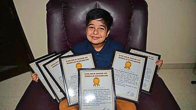 Devaagyh Dixit with his certificates of records.(HT photo) Devaagyh Dixit with his certificates of records.(HT photo)
