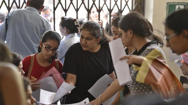 New Delhi, India - June 20, 2018: Delhi university aspirants fill their admission forms for the new academic session 2018-19 at Daulat Ram College, in New Delhi, India, on Wednesday, June 20, 2018. (Photo by Sanchit Khanna/ Hindustan Times) (Sanchit Khanna/HT PHOTO) New Delhi, India - June 20, 2018: Delhi university aspirants fill their admission forms for the new academic session 2018-19 at Daulat Ram College, in New Delhi, India, on Wednesday, June 20, 2018. (Photo by Sanchit Khanna/ Hindustan Times) (Sanchit Khanna/HT PHOTO)
